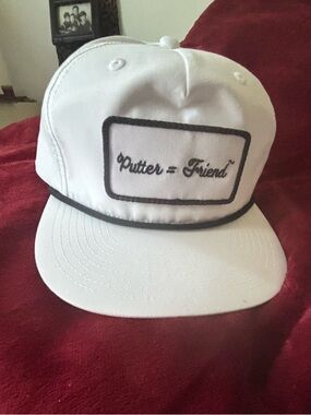White Baseball Cap with "Putter = Friend" Script Patch